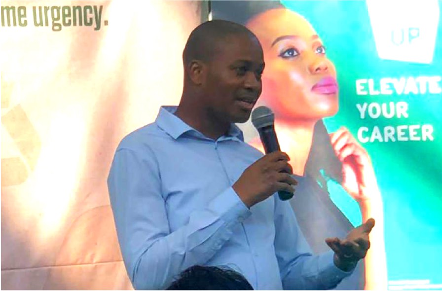 A Unilever employee speaking at an event
